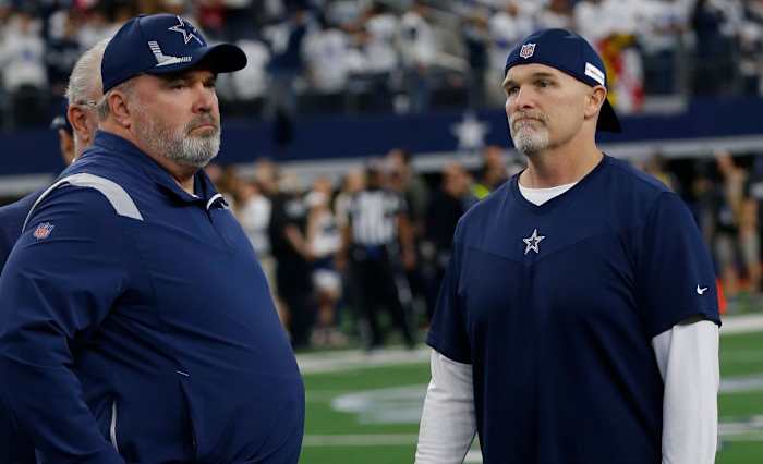 Cowboys coaches McCarthy and Quinn.